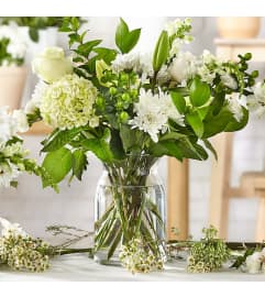 Classic Ivory Bouquet. An arrangement by Oliver Flower Shop. Classic Ivory Bouquet. An arrangement by Oliver Flower Shop.