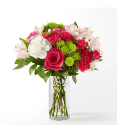 SWEET AND PRETTY. An arrangement by Oliver Flower Shop.