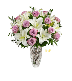 Lilies and Sweet Roses. An arrangement by Brickell Ave Florist.