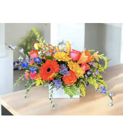 Rustic Colorburst Garden Delight. An arrangement by Rustic Floral and Gifts.