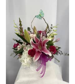 Blushing Blooms. An arrangement by Commerce Flowers.