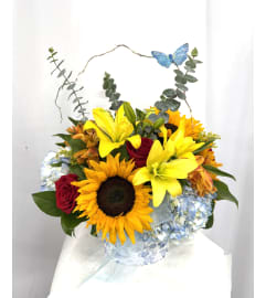 Sunshine Amor. An arrangement by Commerce Flowers.