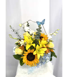 Sunshine Amor. An arrangement by Commerce Flowers.