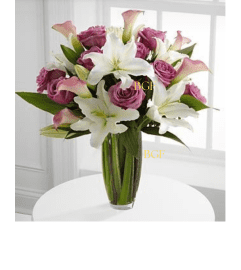 White and Lavender Cala. An arrangement by Anthurium Gardens Florist.