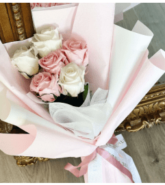 Hand Wrapped Roses Bouquet. An arrangement by La Bolsa Rosa.