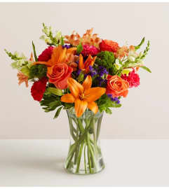 Mother's Day Vibrant Floral Medley. An arrangement by Palmetto Gardens Florist.