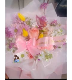 Mamas Mix Bouquet. An arrangement by Geni's Florist and Gifts.