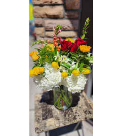 Sunshine Special Flower Arrangement. An arrangement by Flowers by Girlfriends.