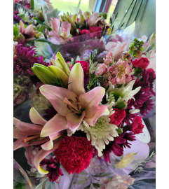 Make Her Day. An arrangement by Abundant Flowers and Gift Shoppe. Make Her Day. An arrangement by Abundant Flowers and Gift Shoppe.