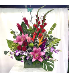 Tropical Sunset Garden. An arrangement by Commerce Flowers.