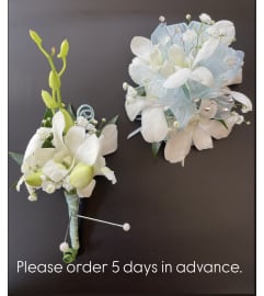 Wrist Corsage Set. An arrangement by Violeta's Flower Shop.