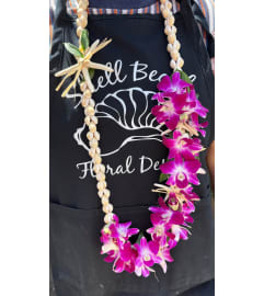 Shell-abration Lei. An arrangement by Shell Beach Floral Design.