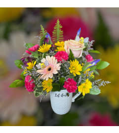 Let It Bee Mug Arrangement. An arrangement by In Bloom.