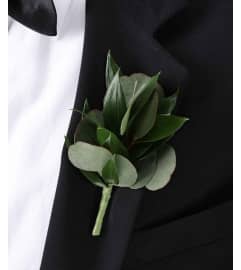 Wedding or prom simple greenery boutonniere. An arrangement by Timp Valley Floral.