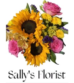 Sally’s Sunshine and Roses. An arrangement by Jimmy's Flower Shop.