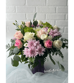 Beyond the Dozen Symphony. An arrangement by Brooklin Floral and Garden Shoppe Inc..
