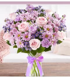 Exclusive White and Lavender. An arrangement by Brickell Exclusive Blooms.