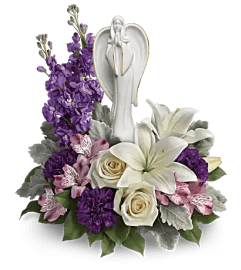 Angelic Petal Embrace. An arrangement by Flore's Shop.