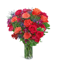Brilliant Bellini. An arrangement by The Flower Shop of Lake Charles.