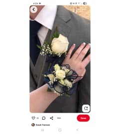 Boutonniere and Corsage Set. An arrangement by Floral Fantasy.