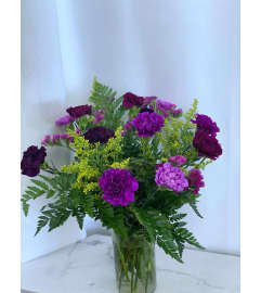 12 Assorted Purple Carnation Vase. An arrangement by Anderson Flowers.