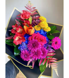 Rainbow Explosion. An arrangement by Mayfield Flowers. Rainbow Explosion. An arrangement by Mayfield Flowers.