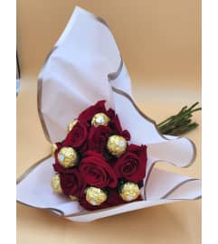 Roses and Ferro. An arrangement by Anne's Flowers and Gifts.