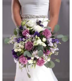 Wedding Lovely lavender bridal bouquet. An arrangement by Timp Valley Floral.