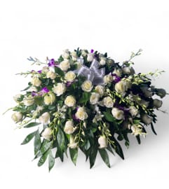 Eternal Grace Bloom Casket Spray. An arrangement by Cinderella's Flowers.