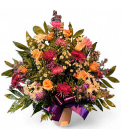 Sunset Garden Embrace. An arrangement by Cinderella's Flowers.
