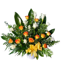 Peach Basket. An arrangement by Cinderella's Flowers.