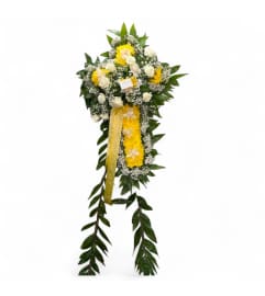 Sunshine and Serenity Cross Spray. An arrangement by Cinderella's Flowers.
