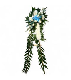 Tranquil Grace Cross Spray. An arrangement by Cinderella's Flowers.