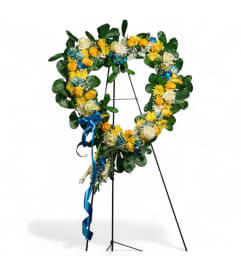 Elegant Heart Spray. An arrangement by Cinderella's Flowers.