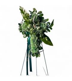 Green Harmony Cross Stand. An arrangement by Cinderella's Flowers.