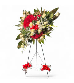Pure Heart Elegance Standing Spray. An arrangement by Cinderella's Flowers.