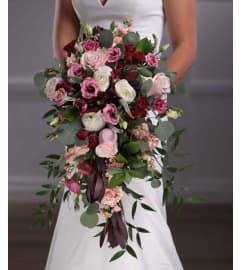 Wedding Burgundy bridal teardrop cascading bouquet. An arrangement by Timp Valley Floral.
