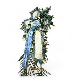 Eternal Blue Embrace Cross Spray. An arrangement by Cinderella's Flowers.
