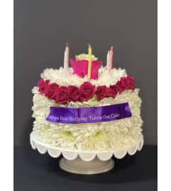BLOOMING BIRTHDAY CAKE. An arrangement by Bill's Flowers Arrangements.