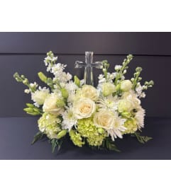 Crystal cross tribute. An arrangement by Bill's Flowers Arrangements.