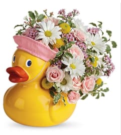 Teleflora's Sweet Little Ducky Bouquet. An arrangement by Believe Flowers.