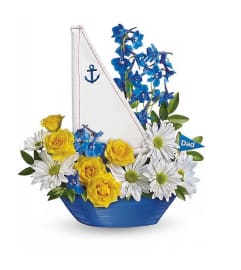 Teleflora's Captain Carefree Bouquet. An arrangement by Believe Flowers.