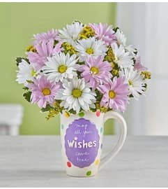 Bountiful Wishes™. An arrangement by Believe Flowers.