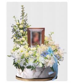 Angelic Harmony Tribute Urn. An arrangement by Flowers by Peter.