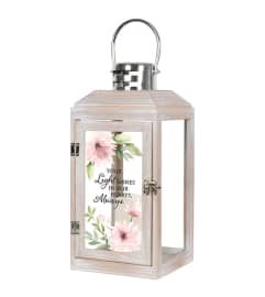 Lantern- Light Shines. An arrangement by The Flower Hut. Lantern- Light Shines. An arrangement by The Flower Hut.