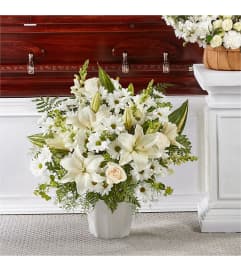 Thoughts of Tranquility Floor Basket. An arrangement by North Liberty Flower Shop.