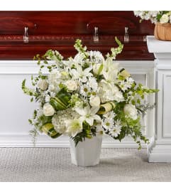 Thoughts of Tranquility Floor Basket. An arrangement by North Liberty Flower Shop.