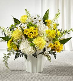 Unity and Grace Floor Basket. An arrangement by North Liberty Flower Shop.