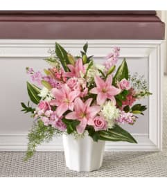 Simply Serene Floor Basket. An arrangement by North Liberty Flower Shop.