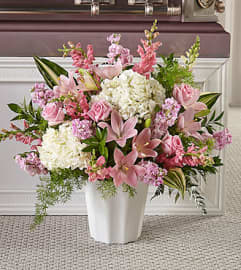 Simply Serene Floor Basket. An arrangement by North Liberty Flower Shop.